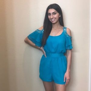 Blue romper. Perfect for beach or day party